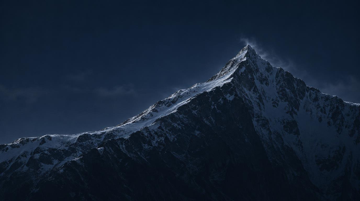 Cinematic fine-art landscape photograph of a single high-altitude mountain ridgeline in profile